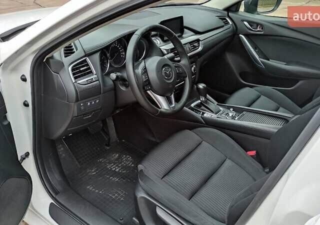 Білий Мазда 6, об'ємом двигуна 2 л та пробігом 170 тис. км за 15500 $, фото 15 на Automoto.ua
