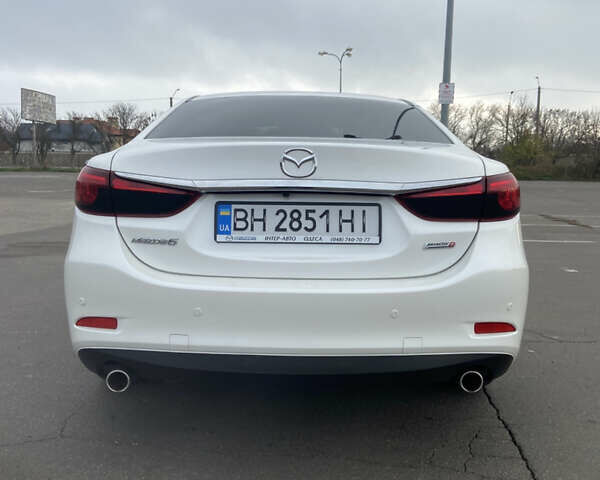Білий Мазда 6, об'ємом двигуна 2.19 л та пробігом 143 тис. км за 12900 $, фото 4 на Automoto.ua
