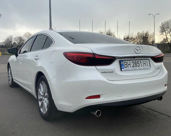 Білий Мазда 6, об'ємом двигуна 2.19 л та пробігом 143 тис. км за 12900 $, фото 6 на Automoto.ua