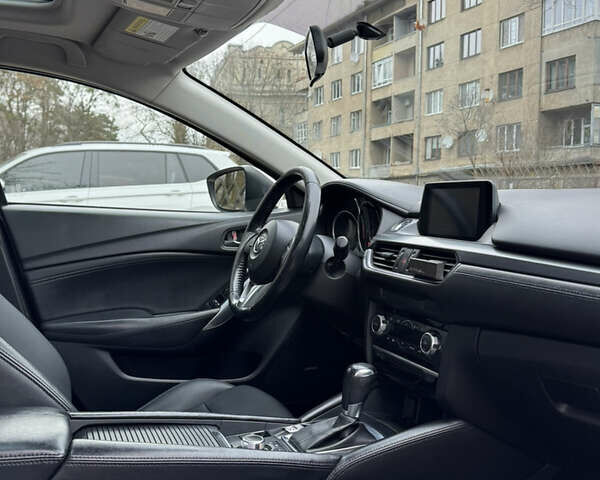 Білий Мазда 6, об'ємом двигуна 2.49 л та пробігом 200 тис. км за 11800 $, фото 13 на Automoto.ua