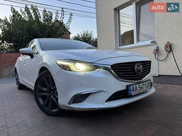 Белый Мазда 6, объемом двигателя 2.49 л и пробегом 200 тыс. км за 16000 $, фото 1 на Automoto.ua
