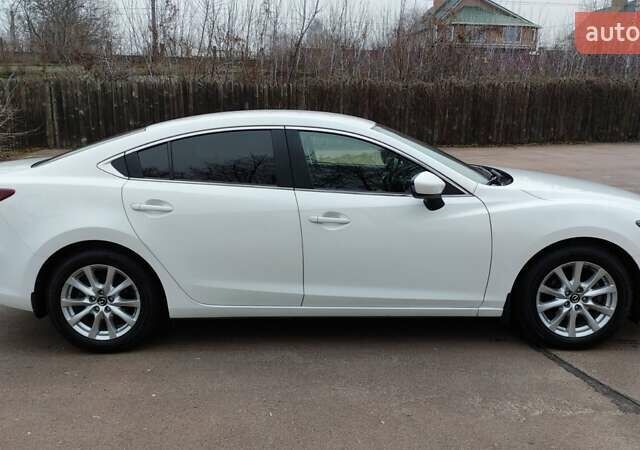 Білий Мазда 6, об'ємом двигуна 2 л та пробігом 170 тис. км за 15500 $, фото 2 на Automoto.ua