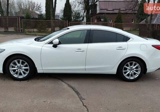 Білий Мазда 6, об'ємом двигуна 2 л та пробігом 170 тис. км за 15500 $, фото 10 на Automoto.ua