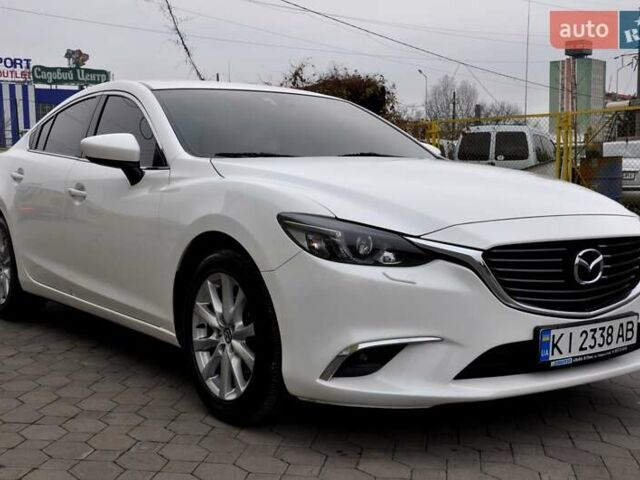 Білий Мазда 6, об'ємом двигуна 2.19 л та пробігом 117 тис. км за 11999 $, фото 6 на Automoto.ua