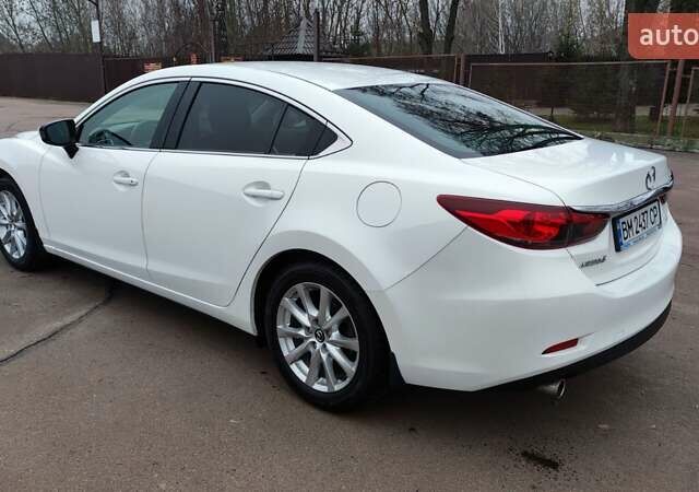 Білий Мазда 6, об'ємом двигуна 2 л та пробігом 170 тис. км за 15500 $, фото 4 на Automoto.ua