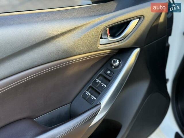 Білий Мазда 6, об'ємом двигуна 2.2 л та пробігом 117 тис. км за 12499 $, фото 13 на Automoto.ua