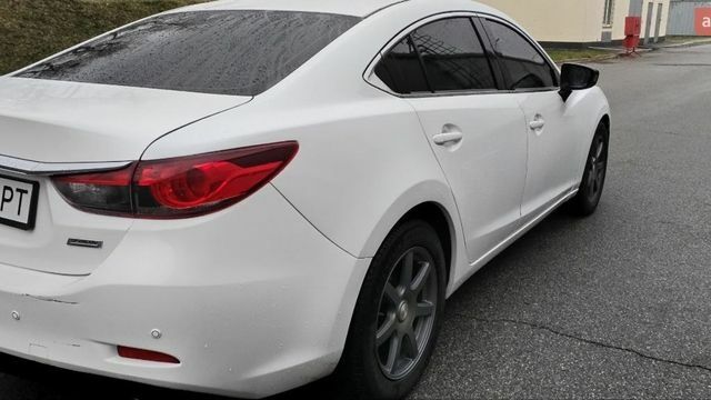 Белый Мазда 6, объемом двигателя 2.49 л и пробегом 125 тыс. км за 9000 $, фото 4 на Automoto.ua