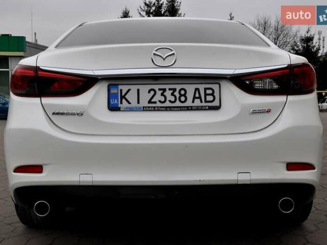 Білий Мазда 6, об'ємом двигуна 2.19 л та пробігом 117 тис. км за 11999 $, фото 10 на Automoto.ua