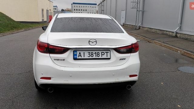 Белый Мазда 6, объемом двигателя 2.49 л и пробегом 125 тыс. км за 9000 $, фото 3 на Automoto.ua