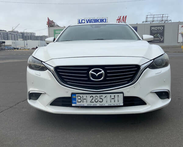 Білий Мазда 6, об'ємом двигуна 2.19 л та пробігом 143 тис. км за 12900 $, фото 1 на Automoto.ua