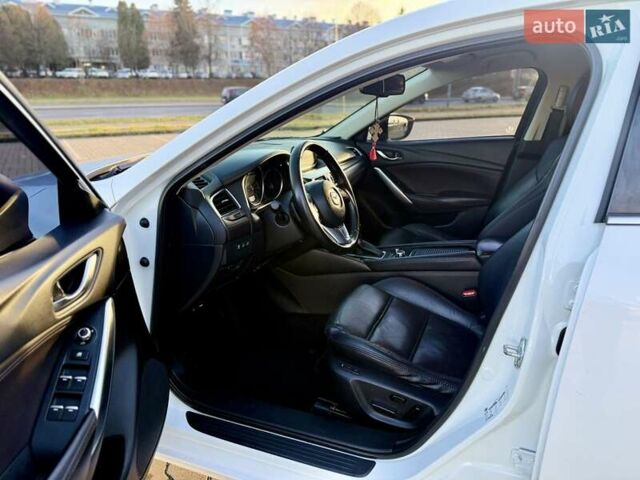 Білий Мазда 6, об'ємом двигуна 2.2 л та пробігом 117 тис. км за 12499 $, фото 12 на Automoto.ua