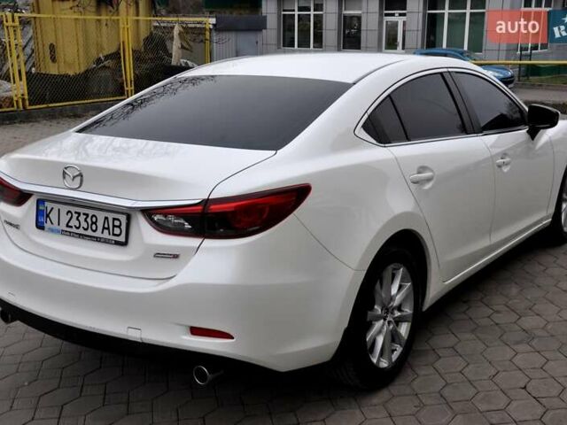 Білий Мазда 6, об'ємом двигуна 2.19 л та пробігом 117 тис. км за 11999 $, фото 7 на Automoto.ua