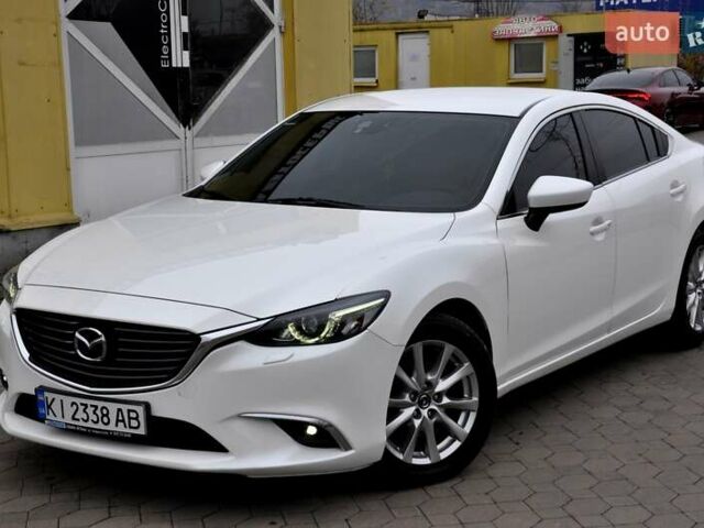 Білий Мазда 6, об'ємом двигуна 2.19 л та пробігом 117 тис. км за 11999 $, фото 39 на Automoto.ua