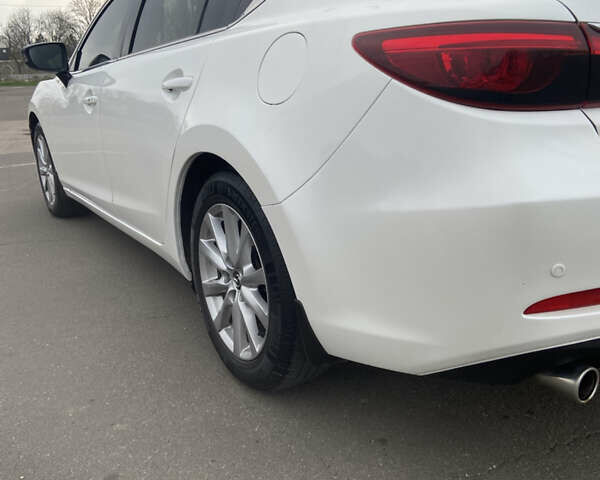 Білий Мазда 6, об'ємом двигуна 2.19 л та пробігом 143 тис. км за 12900 $, фото 7 на Automoto.ua
