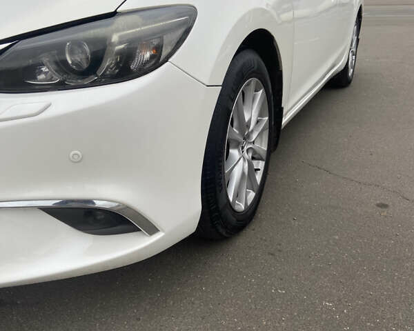 Білий Мазда 6, об'ємом двигуна 2.19 л та пробігом 143 тис. км за 12900 $, фото 11 на Automoto.ua