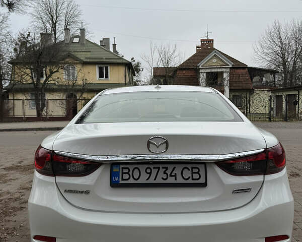 Білий Мазда 6, об'ємом двигуна 2.49 л та пробігом 200 тис. км за 11800 $, фото 8 на Automoto.ua