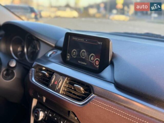 Білий Мазда 6, об'ємом двигуна 2.2 л та пробігом 117 тис. км за 12499 $, фото 25 на Automoto.ua