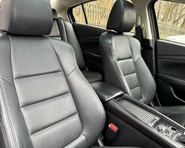 Білий Мазда 6, об'ємом двигуна 2.49 л та пробігом 200 тис. км за 11800 $, фото 16 на Automoto.ua