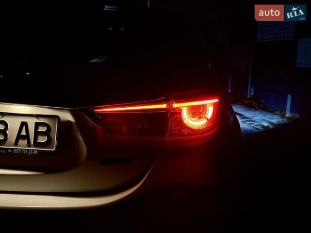 Білий Мазда 6, об'ємом двигуна 2.2 л та пробігом 117 тис. км за 12499 $, фото 35 на Automoto.ua