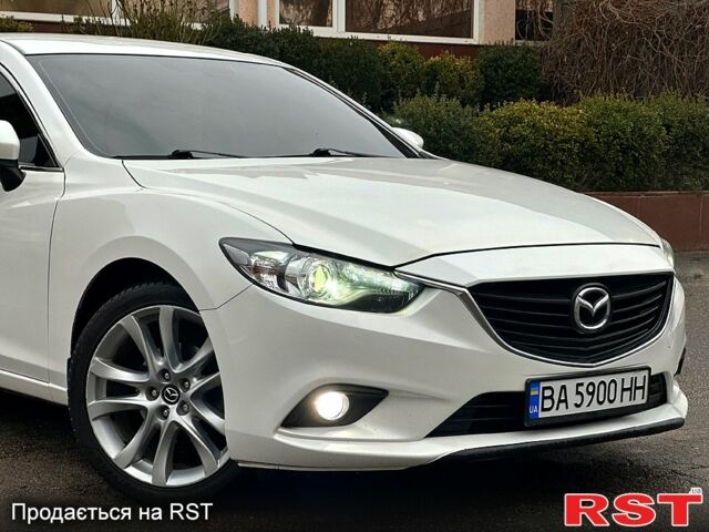 Белый Мазда 6, объемом двигателя 2.5 л и пробегом 140 тыс. км за 13399 $, фото 4 на Automoto.ua