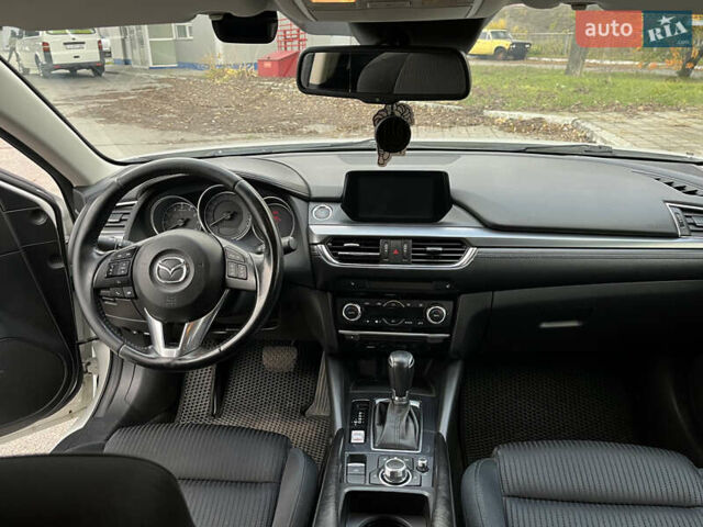 Білий Мазда 6, об'ємом двигуна 2 л та пробігом 200 тис. км за 15200 $, фото 13 на Automoto.ua