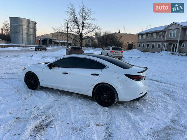Білий Мазда 6, об'ємом двигуна 2.49 л та пробігом 180 тис. км за 9900 $, фото 9 на Automoto.ua