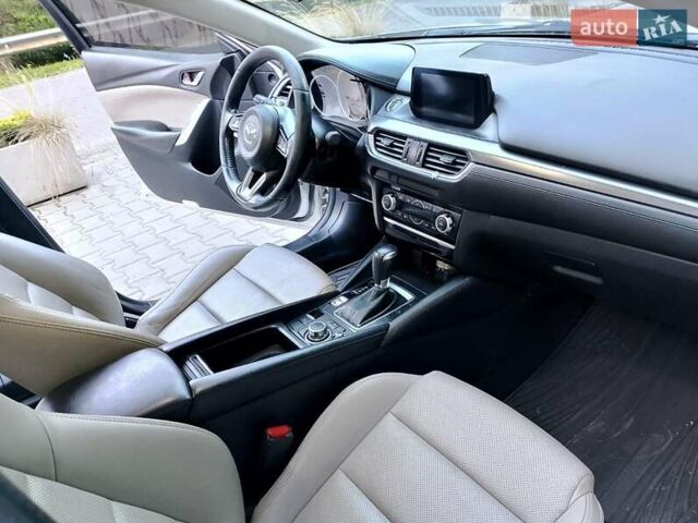 Белый Мазда 6, объемом двигателя 2.49 л и пробегом 174 тыс. км за 11000 $, фото 8 на Automoto.ua