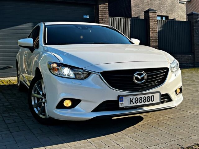 Білий Мазда 6, об'ємом двигуна 2 л та пробігом 197 тис. км за 13554 $, фото 14 на Automoto.ua