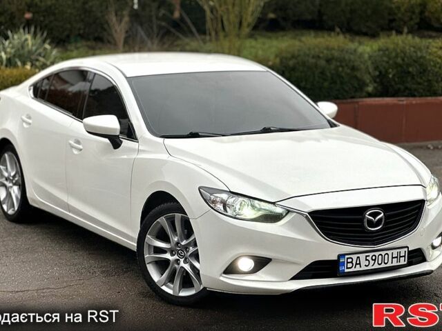 Белый Мазда 6, объемом двигателя 2.5 л и пробегом 140 тыс. км за 13399 $, фото 1 на Automoto.ua