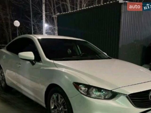 Белый Мазда 6, объемом двигателя 2.5 л и пробегом 245 тыс. км за 11500 $, фото 1 на Automoto.ua