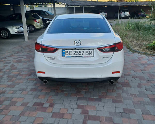 Белый Мазда 6, объемом двигателя 2 л и пробегом 67 тыс. км за 16000 $, фото 4 на Automoto.ua