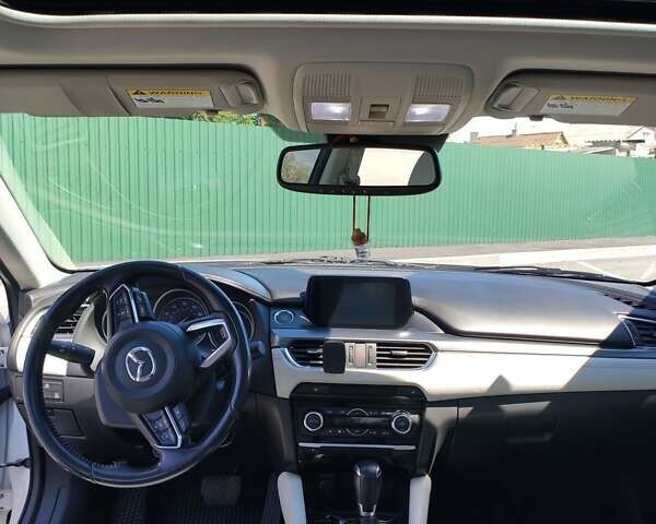 Білий Мазда 6, об'ємом двигуна 2.49 л та пробігом 127 тис. км за 16700 $, фото 9 на Automoto.ua
