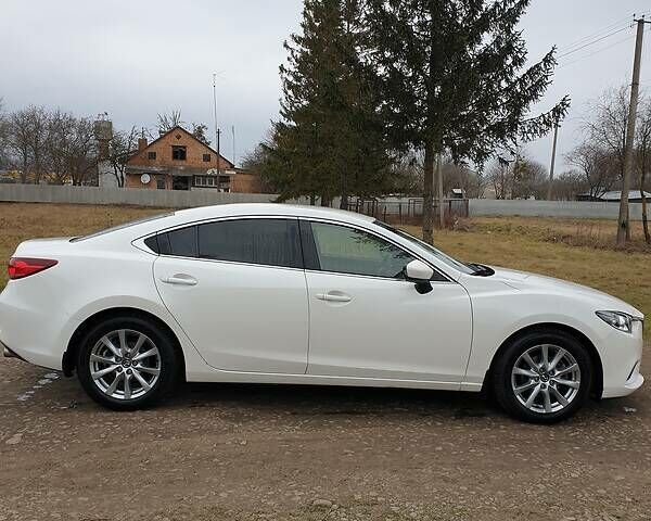 Белый Мазда 6, объемом двигателя 2 л и пробегом 143 тыс. км за 13100 $, фото 4 на Automoto.ua