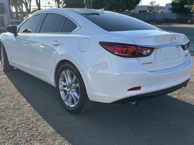 Білий Мазда 6, об'ємом двигуна 2.5 л та пробігом 70 тис. км за 9500 $, фото 2 на Automoto.ua