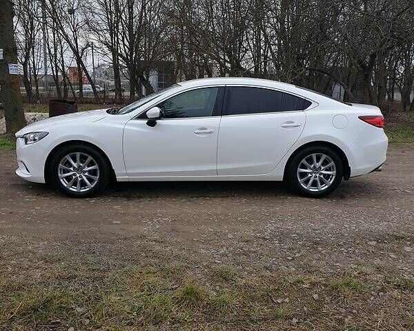 Белый Мазда 6, объемом двигателя 2 л и пробегом 143 тыс. км за 13100 $, фото 9 на Automoto.ua