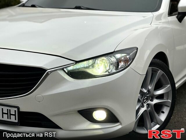 Белый Мазда 6, объемом двигателя 2.5 л и пробегом 140 тыс. км за 13399 $, фото 6 на Automoto.ua