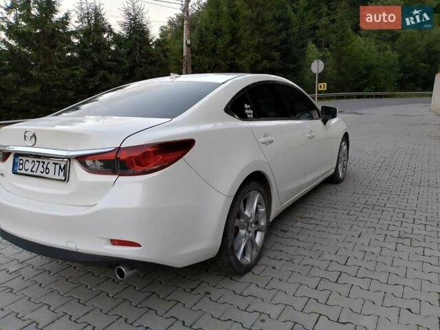 Белый Мазда 6, объемом двигателя 2.49 л и пробегом 174 тыс. км за 11000 $, фото 6 на Automoto.ua