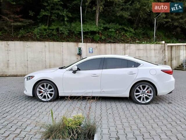 Белый Мазда 6, объемом двигателя 2.49 л и пробегом 174 тыс. км за 11000 $, фото 4 на Automoto.ua