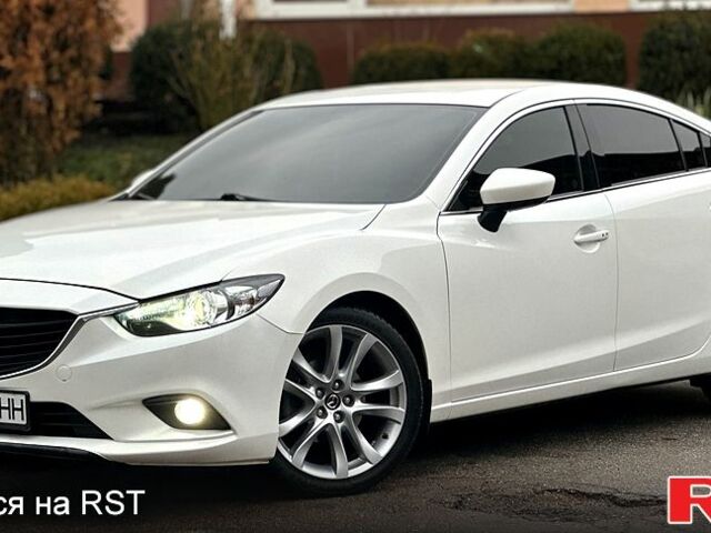 Белый Мазда 6, объемом двигателя 2.5 л и пробегом 140 тыс. км за 13399 $, фото 7 на Automoto.ua