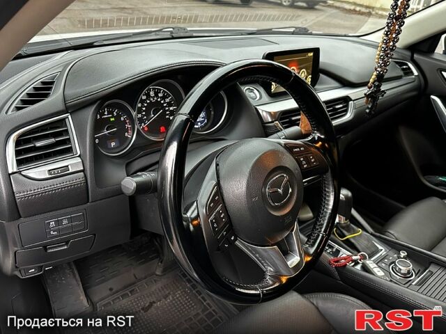 Белый Мазда 6, объемом двигателя 2.5 л и пробегом 140 тыс. км за 13399 $, фото 11 на Automoto.ua