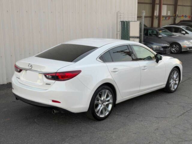 Белый Мазда 6, объемом двигателя 2.5 л и пробегом 77 тыс. км за 7100 $, фото 2 на Automoto.ua