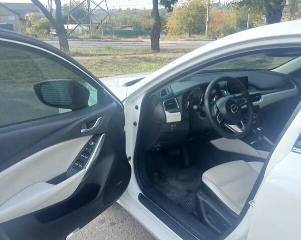 Белый Мазда 6, объемом двигателя 2.49 л и пробегом 124 тыс. км за 15500 $, фото 7 на Automoto.ua