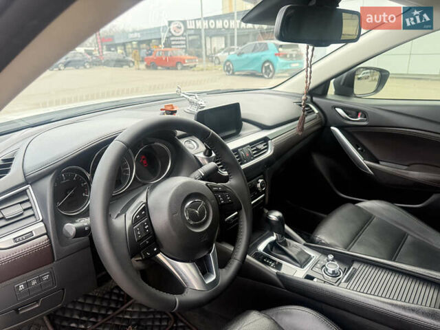 Білий Мазда 6, об'ємом двигуна 2.2 л та пробігом 109 тис. км за 16300 $, фото 19 на Automoto.ua