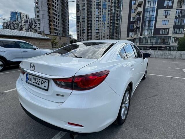 Білий Мазда 6, об'ємом двигуна 2 л та пробігом 183 тис. км за 12700 $, фото 17 на Automoto.ua