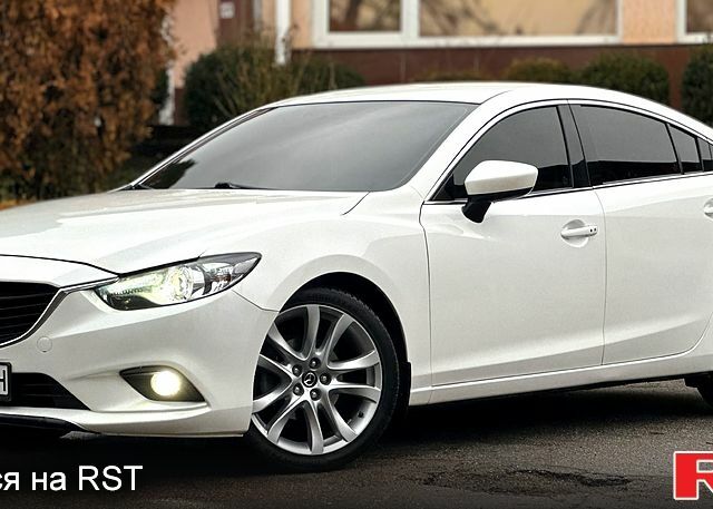 Белый Мазда 6, объемом двигателя 2.5 л и пробегом 140 тыс. км за 13399 $, фото 10 на Automoto.ua