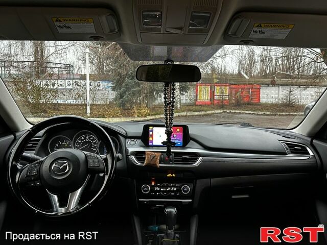 Белый Мазда 6, объемом двигателя 2.5 л и пробегом 140 тыс. км за 13399 $, фото 12 на Automoto.ua