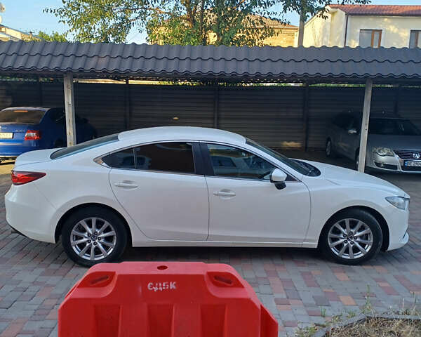 Белый Мазда 6, объемом двигателя 2 л и пробегом 67 тыс. км за 16000 $, фото 2 на Automoto.ua