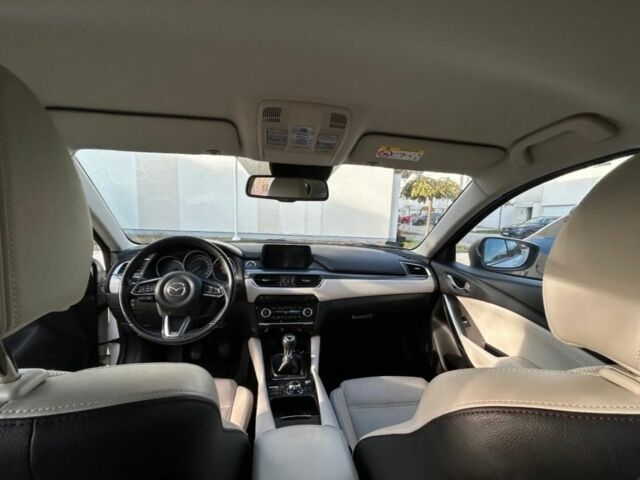 Белый Мазда 6, объемом двигателя 2 л и пробегом 78 тыс. км за 8000 $, фото 2 на Automoto.ua