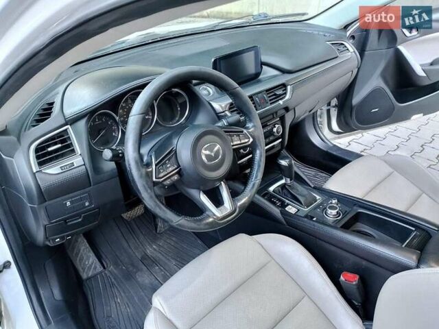 Белый Мазда 6, объемом двигателя 2.49 л и пробегом 174 тыс. км за 11000 $, фото 17 на Automoto.ua