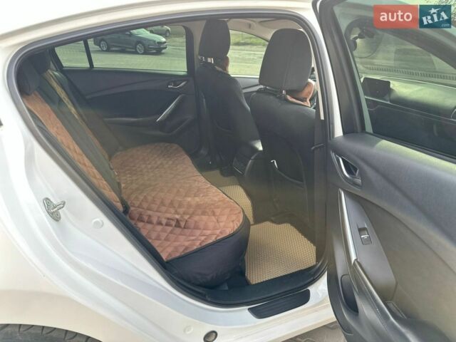 Білий Мазда 6, об'ємом двигуна 2.19 л та пробігом 66 тис. км за 15000 $, фото 15 на Automoto.ua
